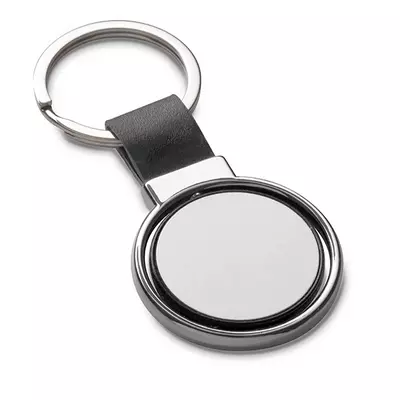 Keychain with rotating tile