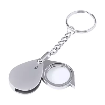 Metal keyring with magnifying glass