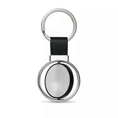 Keychain with rotating tile