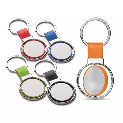 Keychain with rotating tile